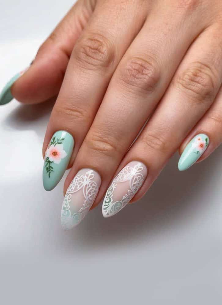 Delicate flowers and intricate lace patterns in a mesmerizing filigree design dance across the nails.