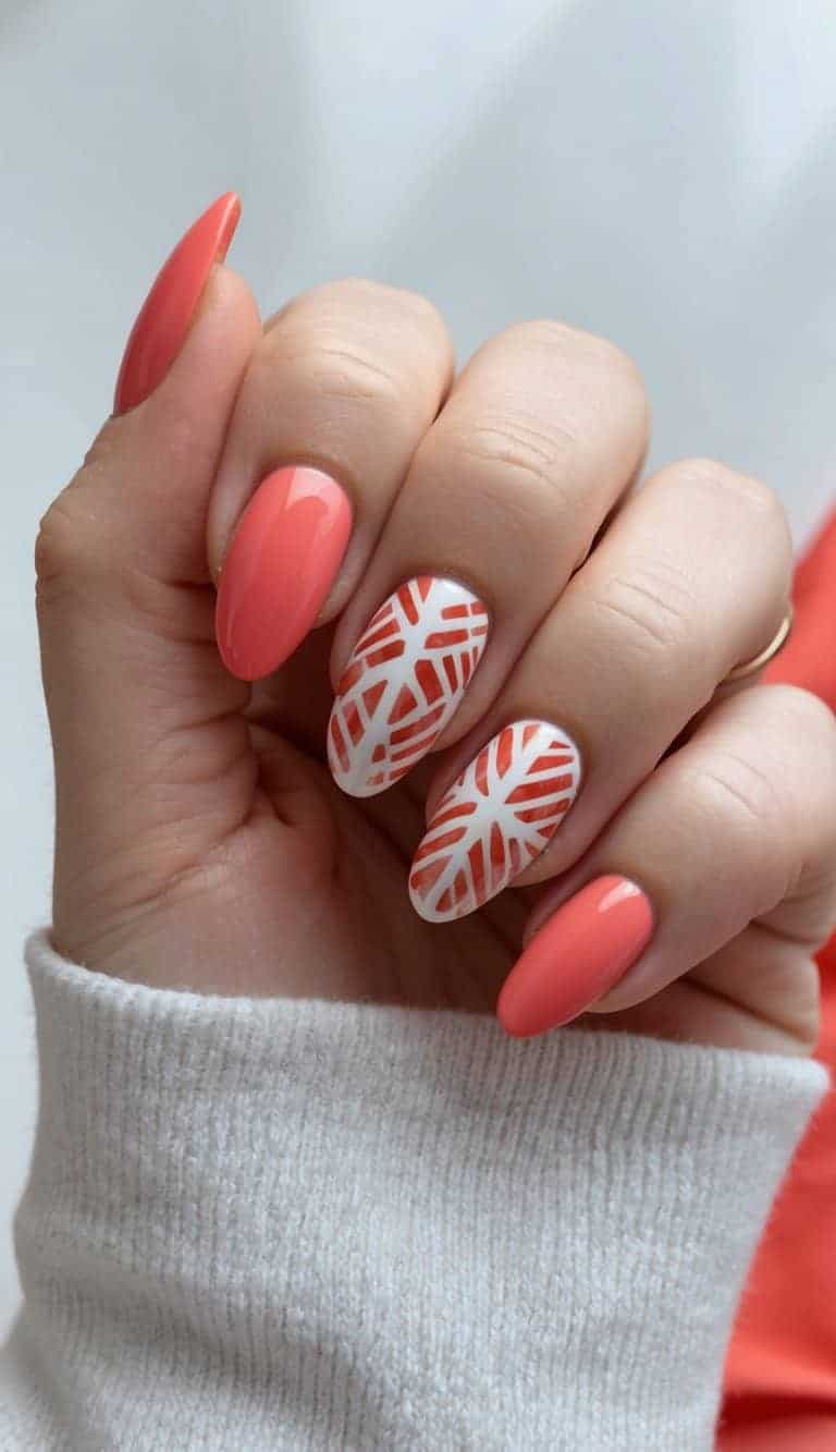 Vibrant coral nail art designs featuring geometric coral patterns