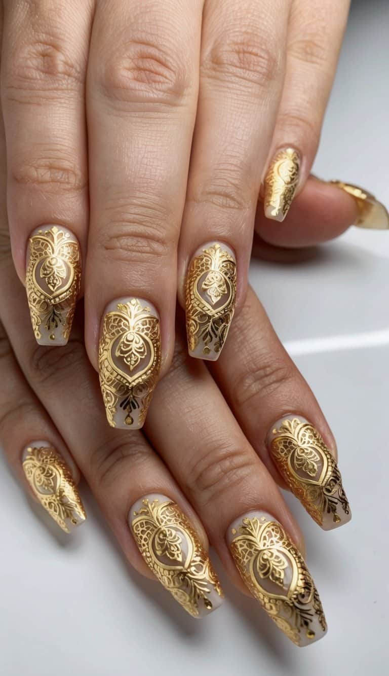 A close-up of intricate golden mandalas on acrylic nails