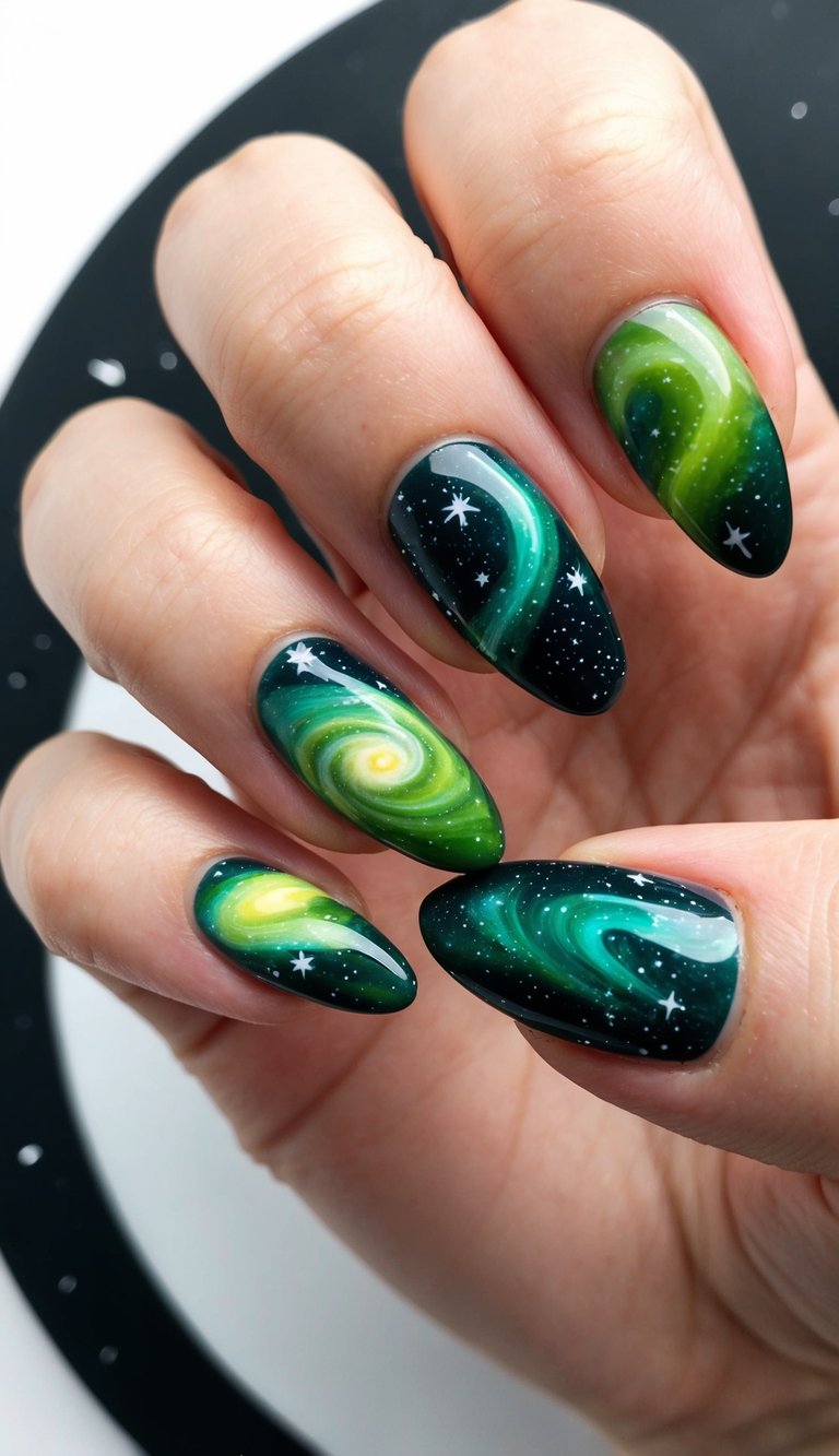Cosmic-inspired olive green nail art idea shown on a hand with galaxy swirls and tiny white stars over deep green gradients and glossy finishes.