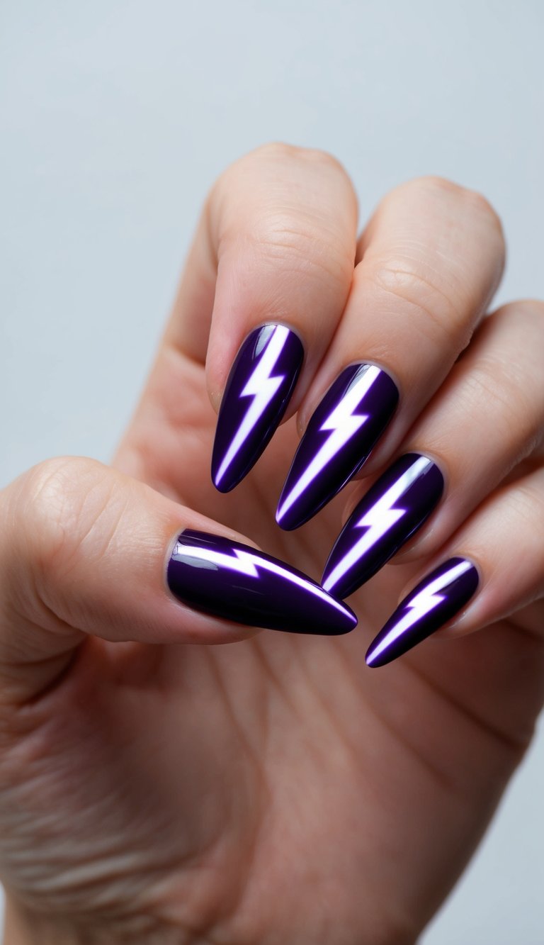 A close-up of a hand reveals pointed violet chrome-like nails decorated with striking white lightning bolt shapes, presenting a purple and black nail art idea with a high-gloss finish.