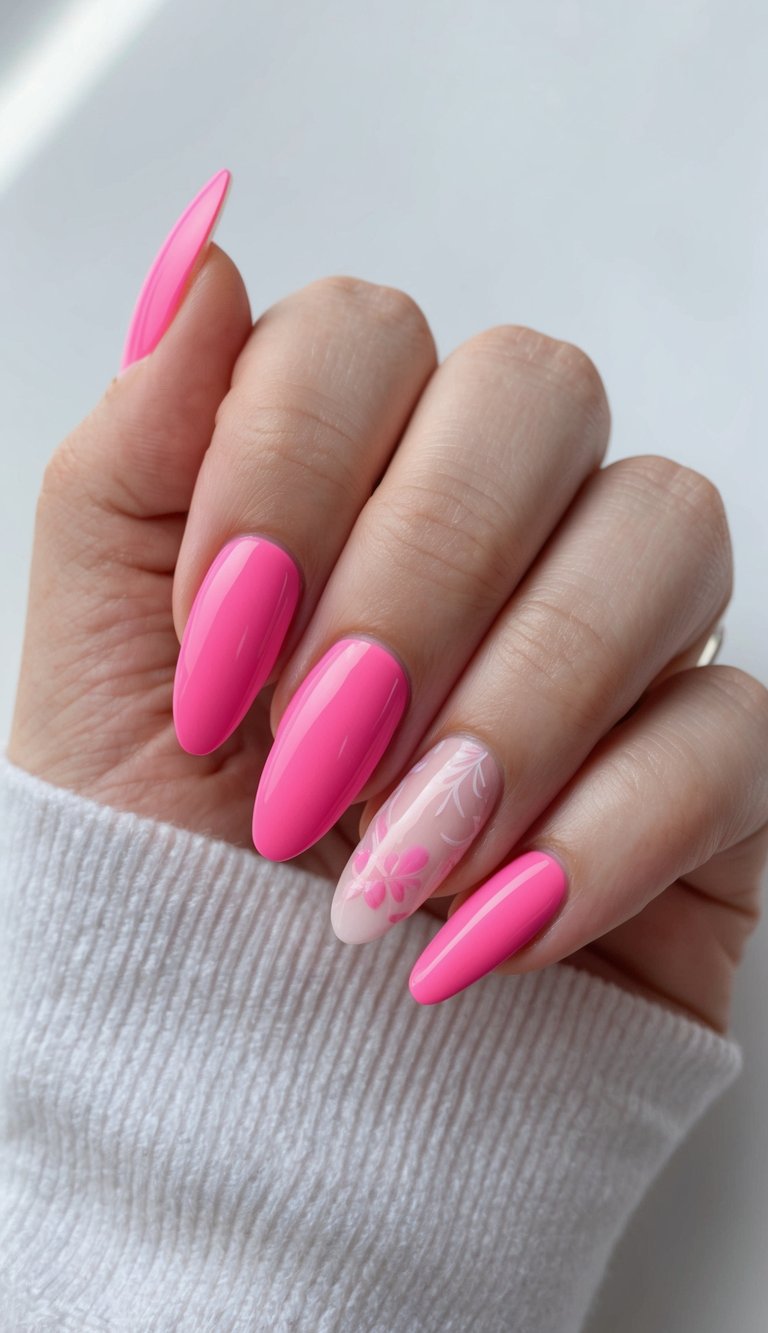 Close-up of a hand wearing a bridesmaid nail art idea with glossy bubblegum pink manicure and a blush accent nail featuring delicate white floral detailing