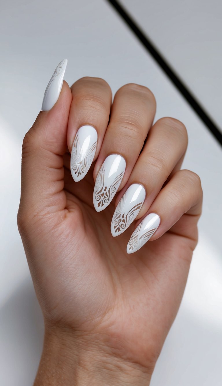 Manicured fingers gently curled inward, displaying a white chrome nail art idea with pearly chrome nails and intricate lace-like swirl patterns.