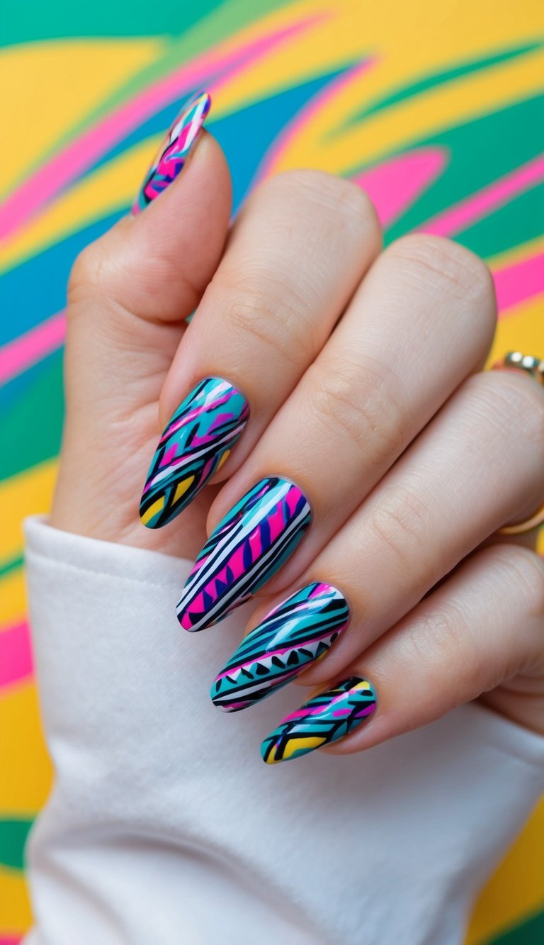 Manicured hand with almond-shaped nails featuring a colorful nail art idea composed of teal, pink, yellow, and black abstract zigzag and stripe nail patterns.