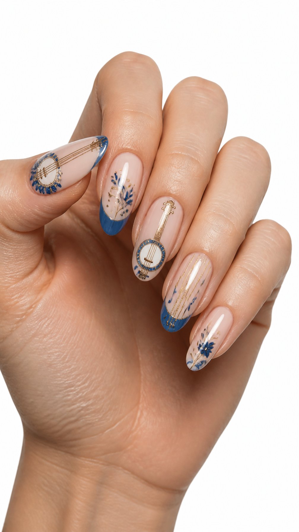 A single hand displays manicured nails with blue and gold musical designs on a white background.