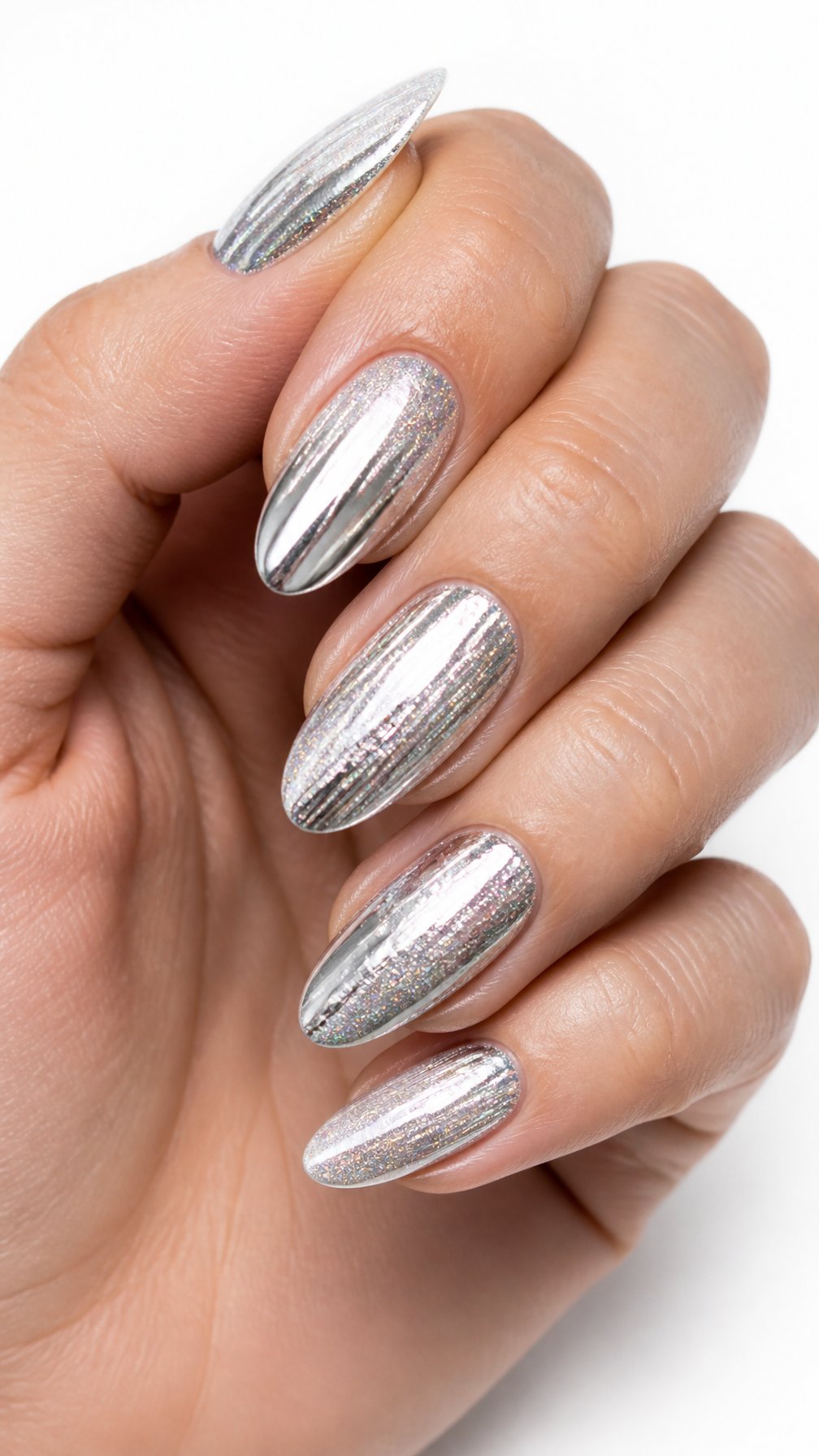A single hand displays almond-shaped silver glitter nails against a white background.