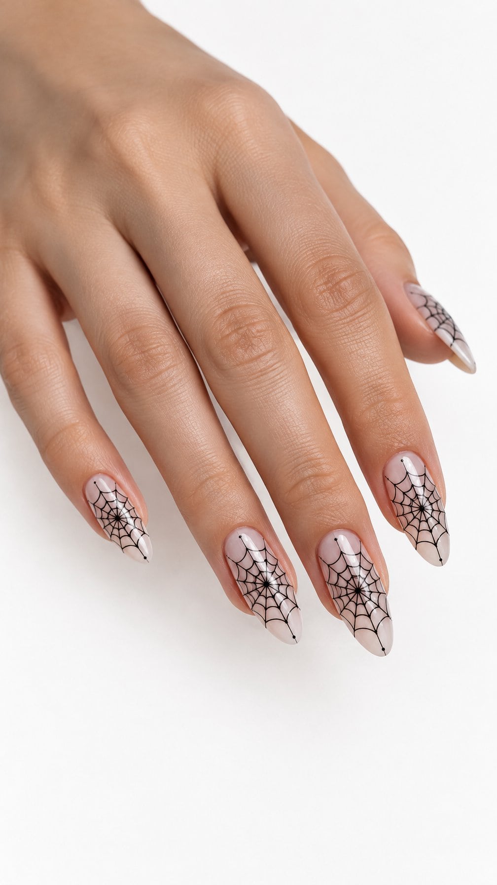 Glossy almond-shaped nails decorated with delicate black spider web designs