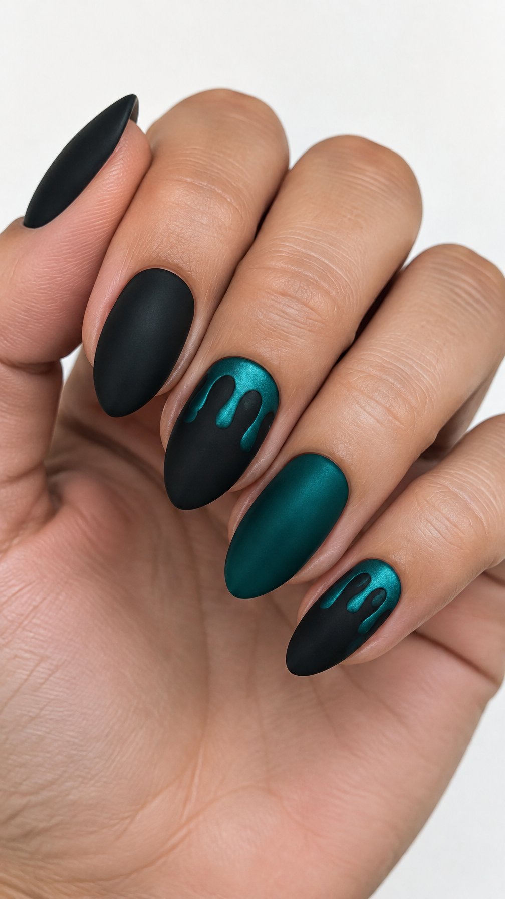 Black and teal painted nails