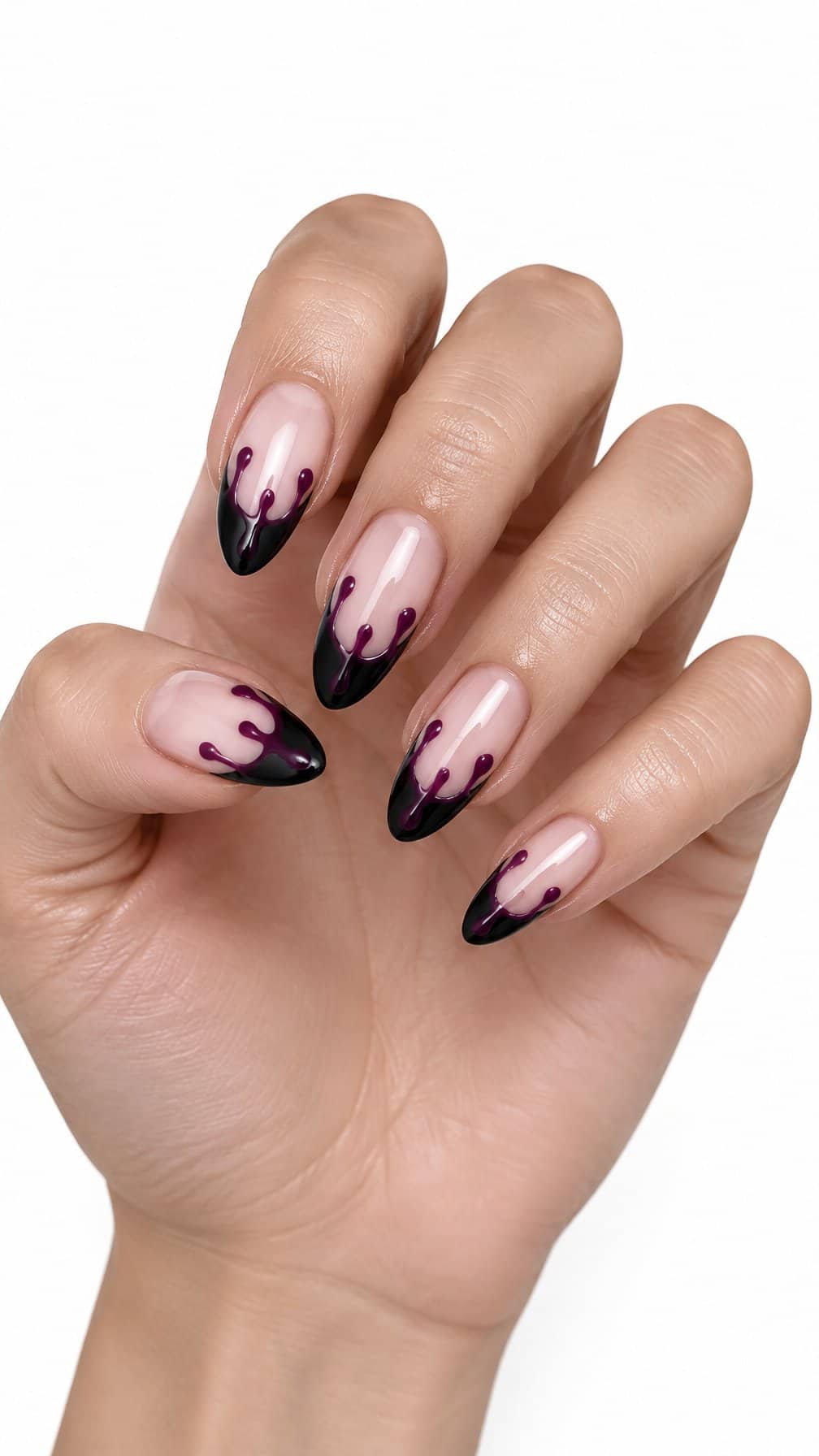 Glossy black French-tip nails decorated with purple drips