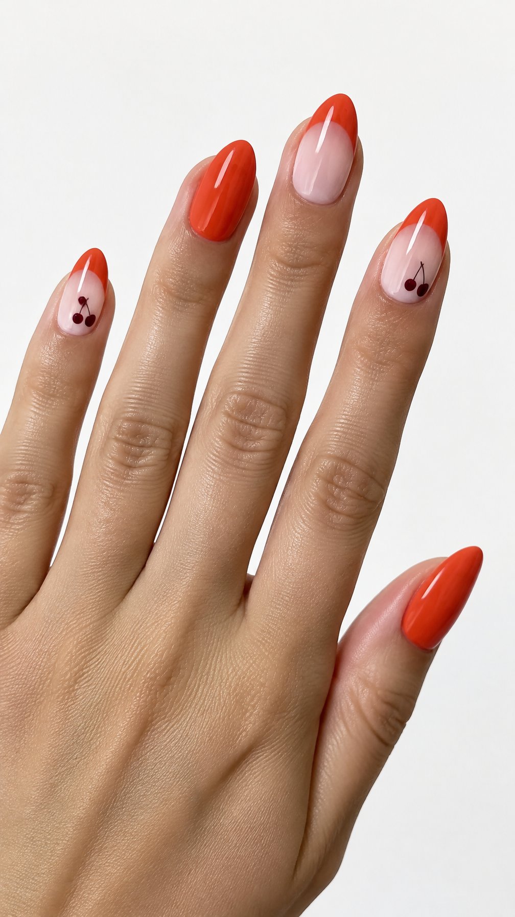 A glossy orange and burgundy manicure