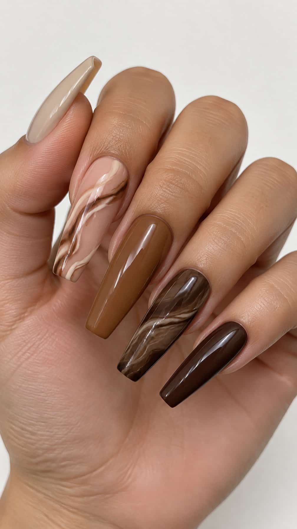 Long glossy brown marble ombre coffin-shaped nails