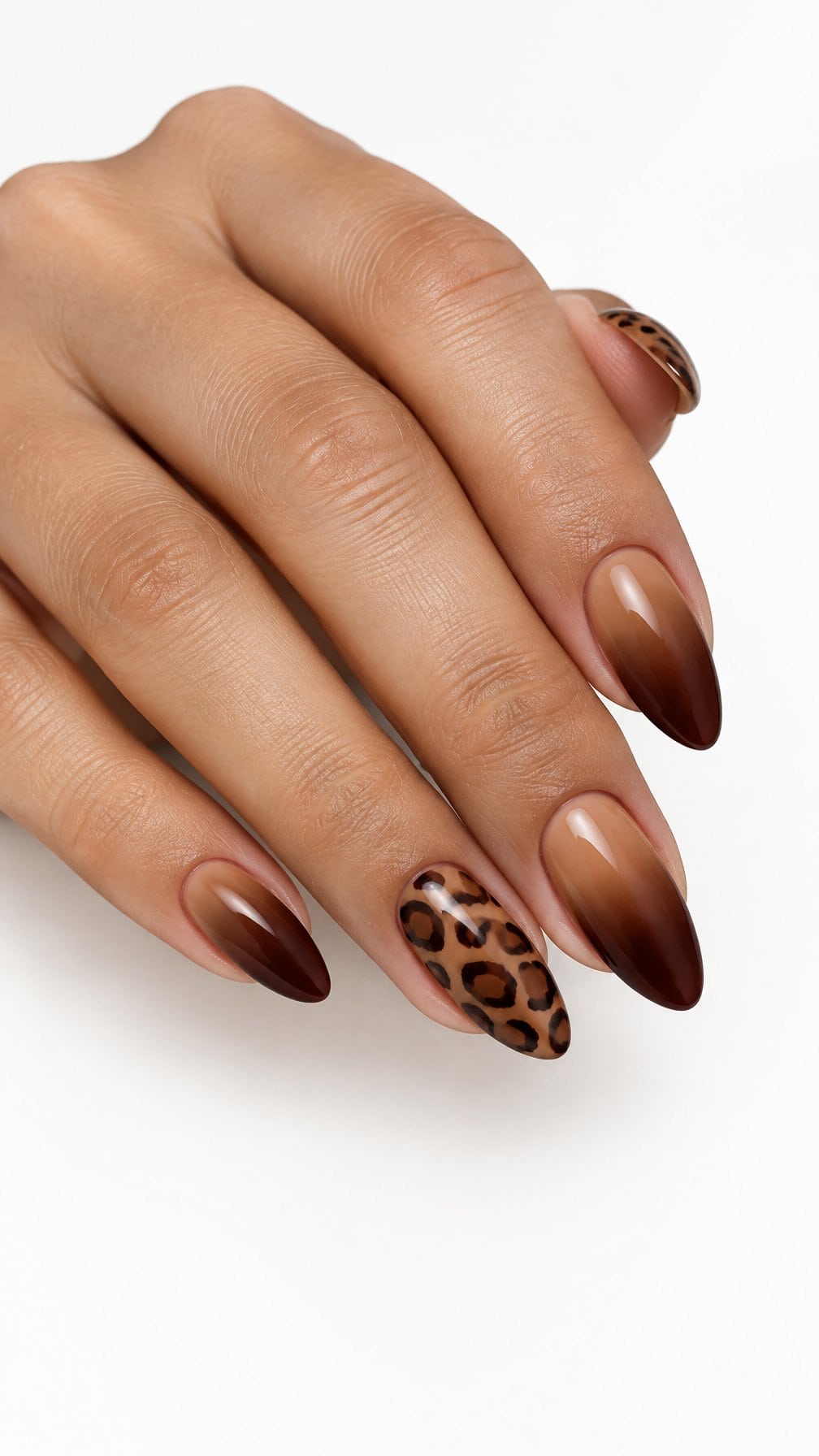 Caramel ombre nails and leopard-print accent designs