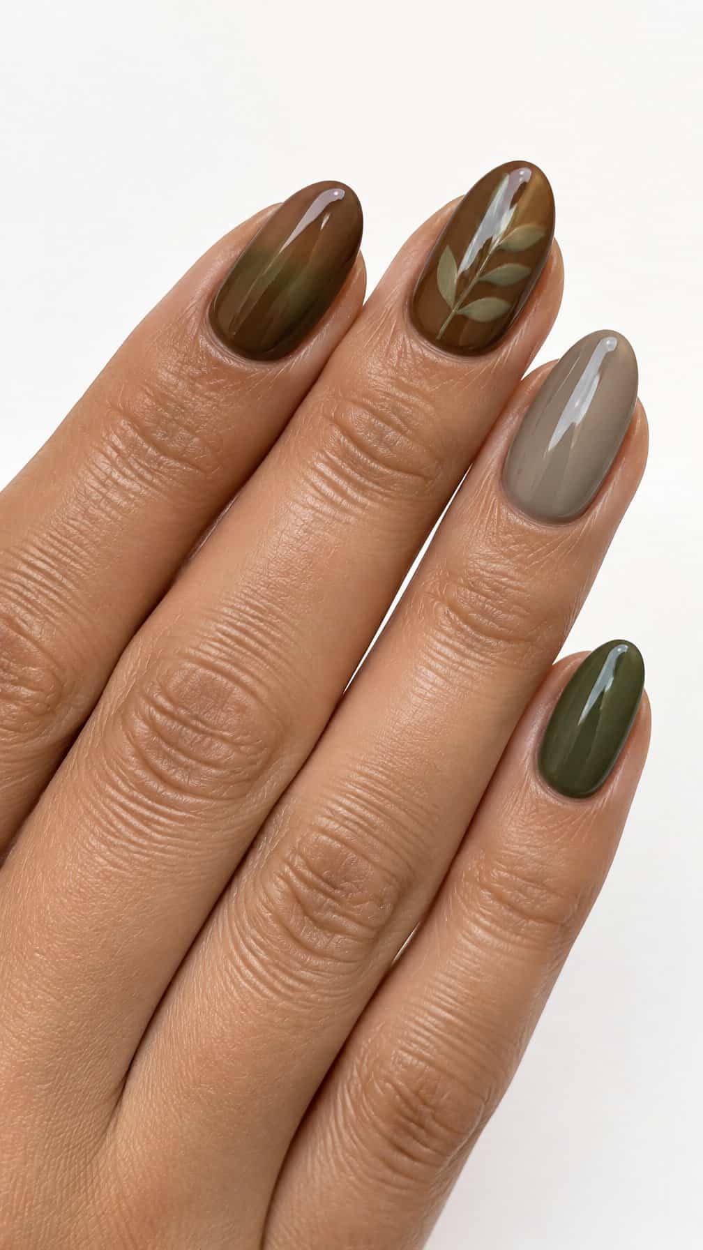 Glossy brown and olive-green gel-painted nails