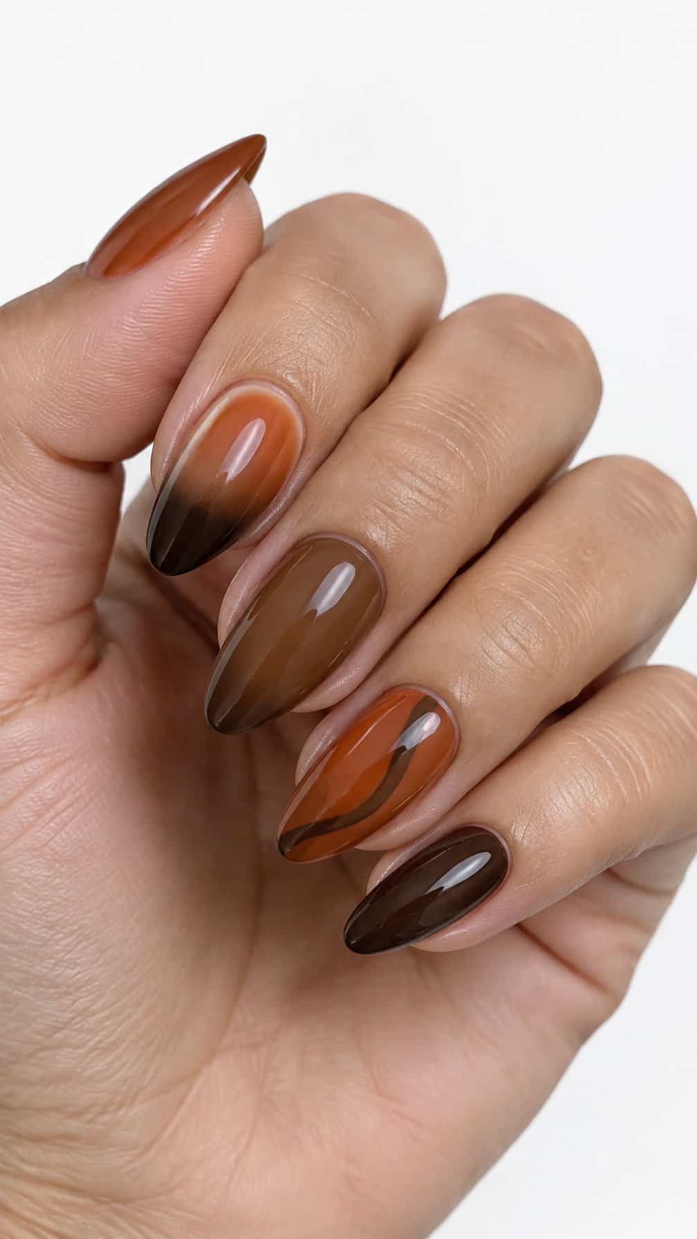 Glossy burnt sienna and brown ombre manicure nails