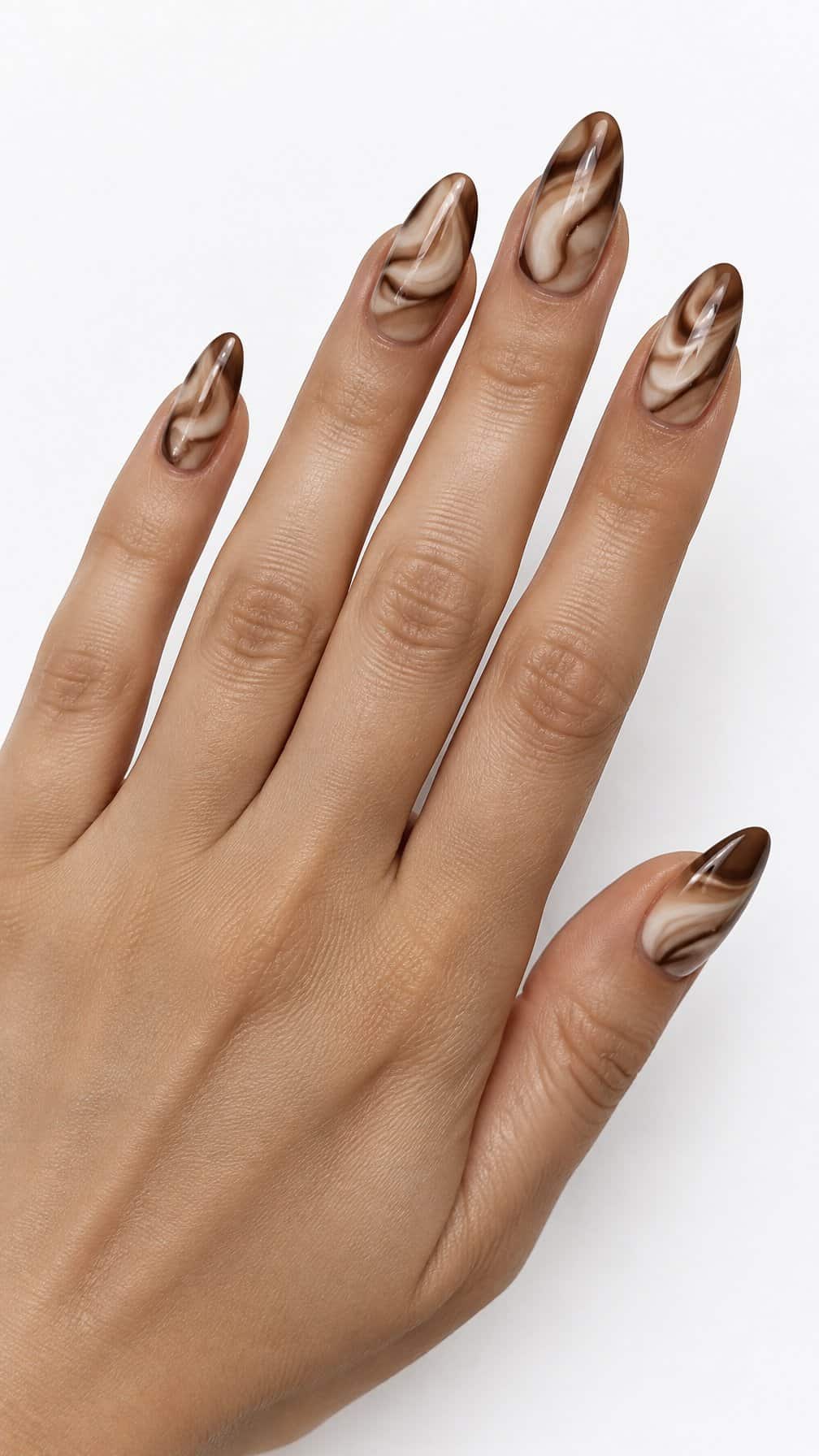 Glossy brown ombre nails featuring creamy cappuccino swirl designs