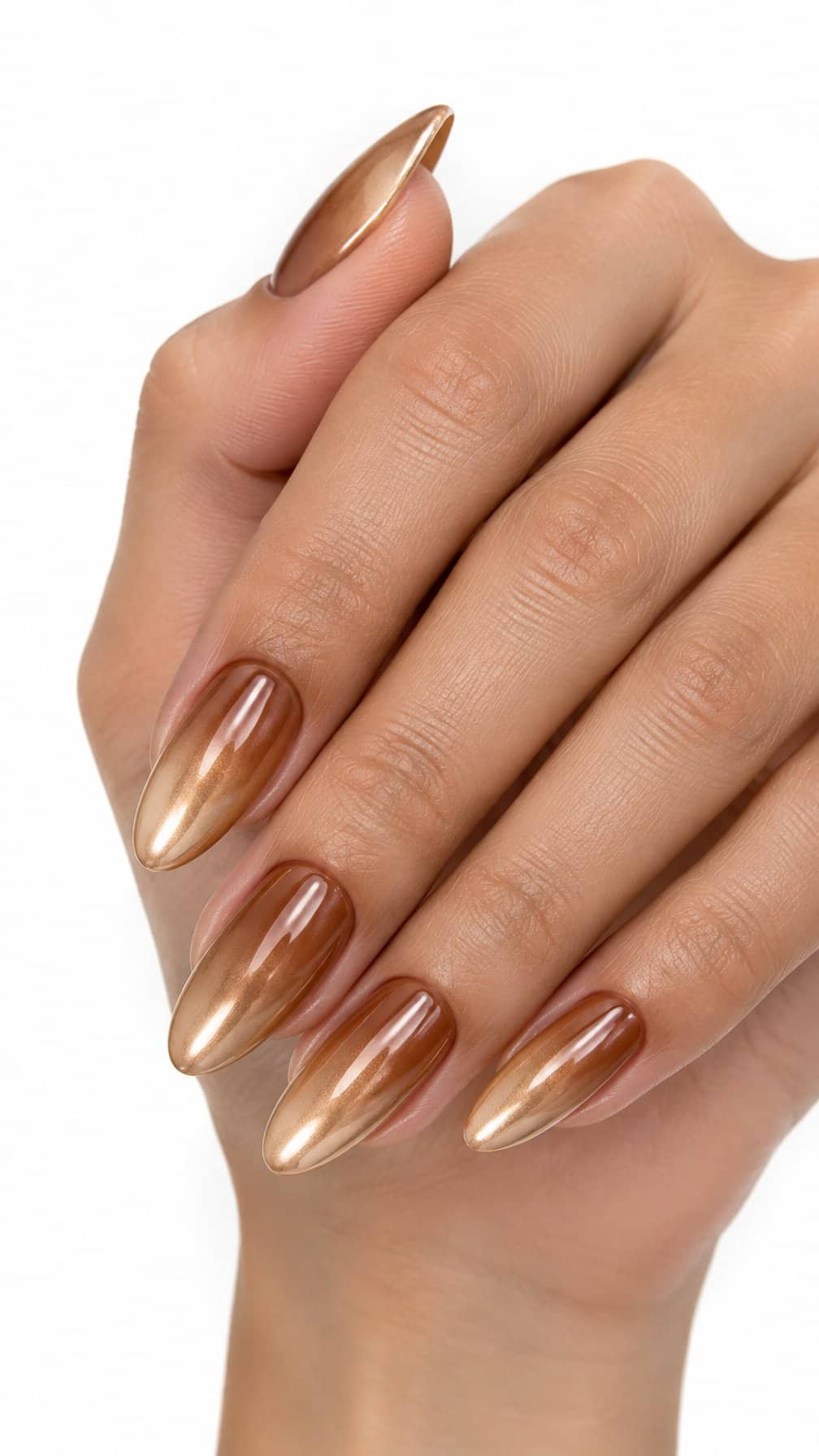 Almond-shaped caramel and gold ombre manicure