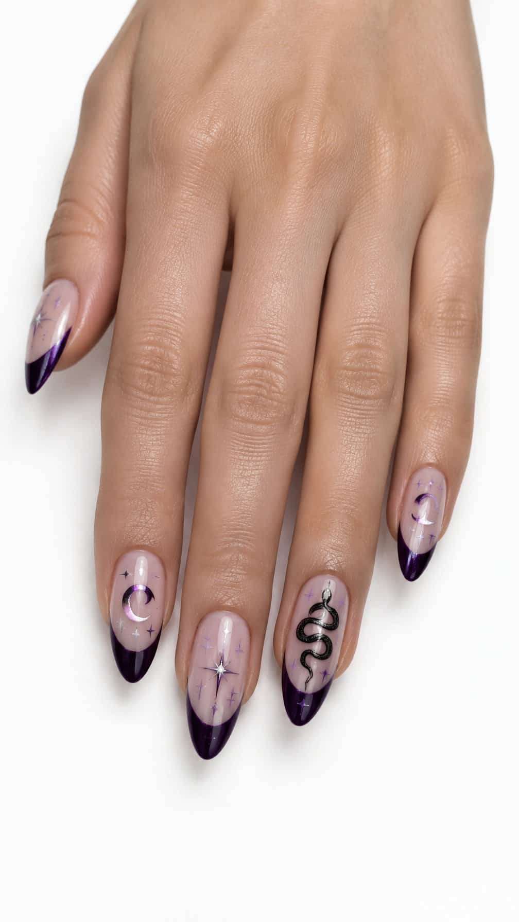 Glossy purple French tip nails decorated with moons, stars, and a black snake