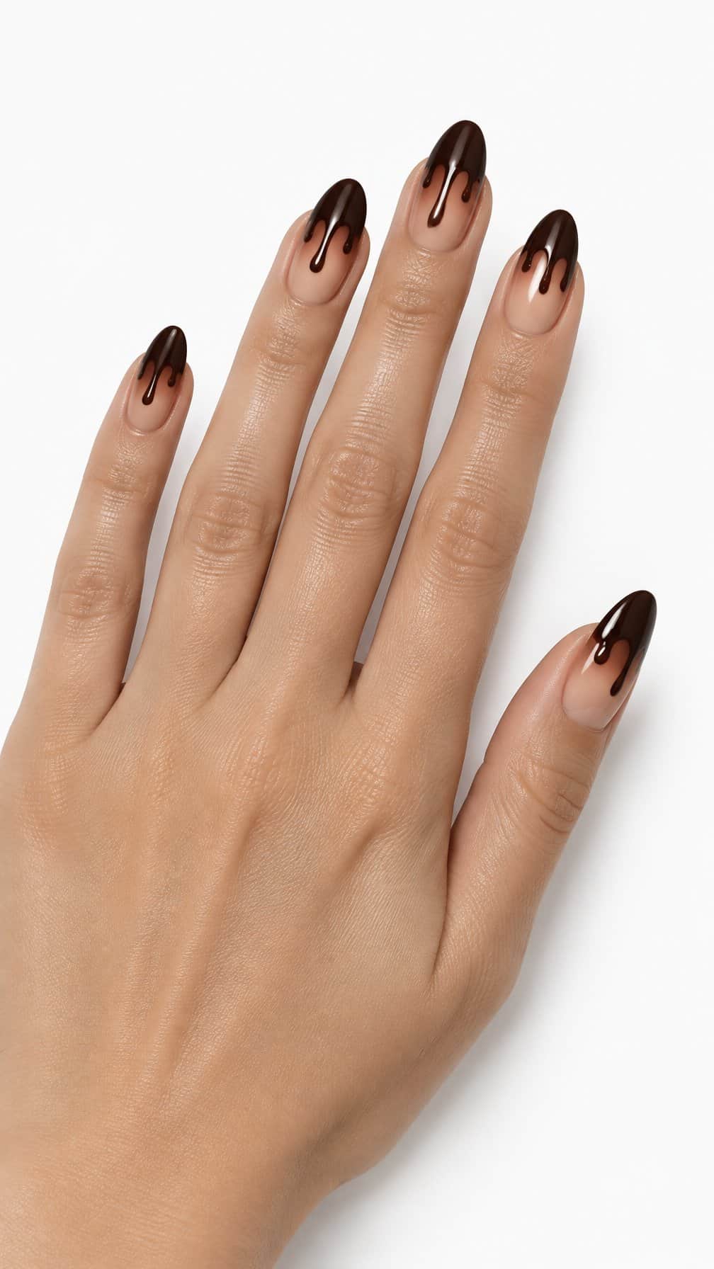 Almond-shaped nails featuring glossy caramel-to-chocolate ombre polish and melted chocolate-inspired tips