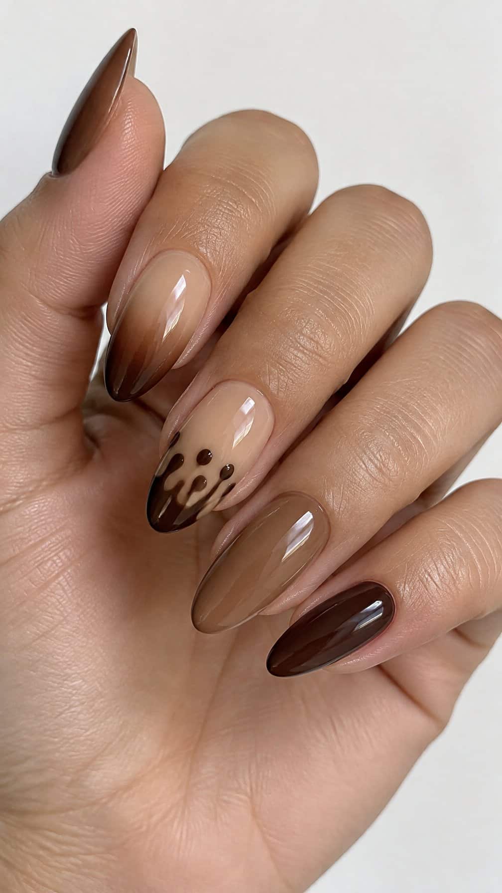 Glossy brown ombre nails and simple chocolate-drip designs