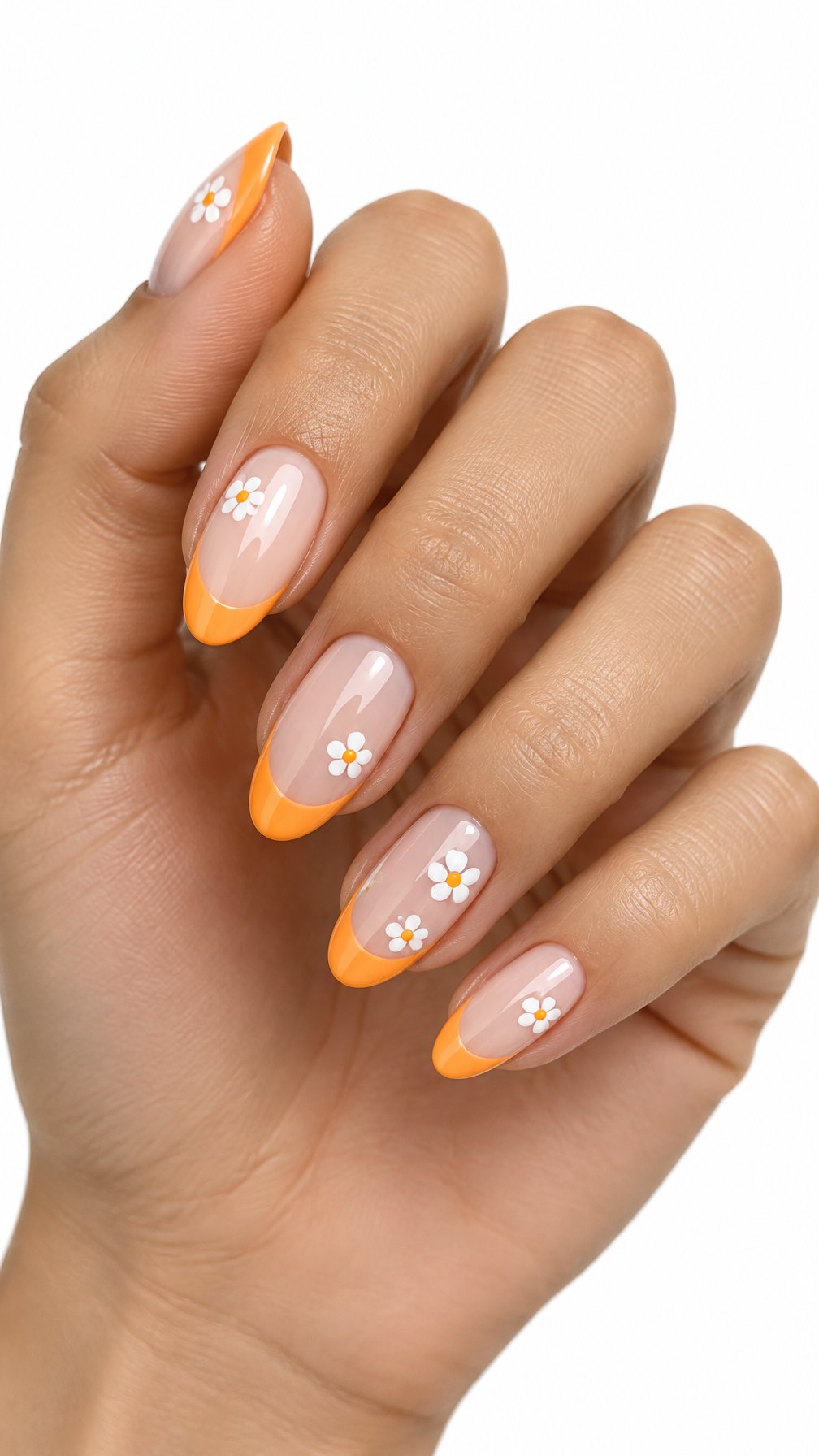 Glossy orange French-tip nails decorated with small white daisies