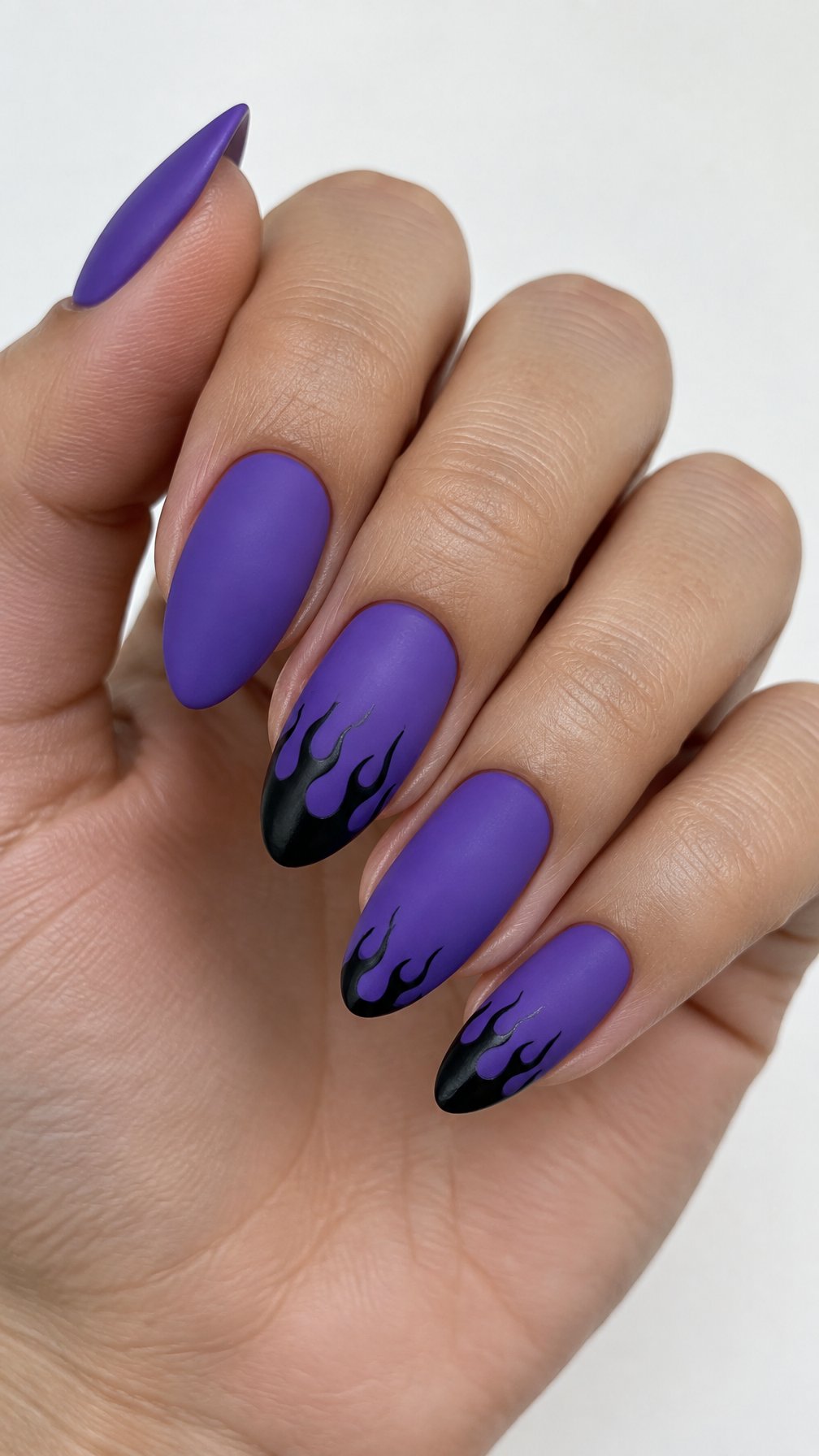Violet nails and black flame designs