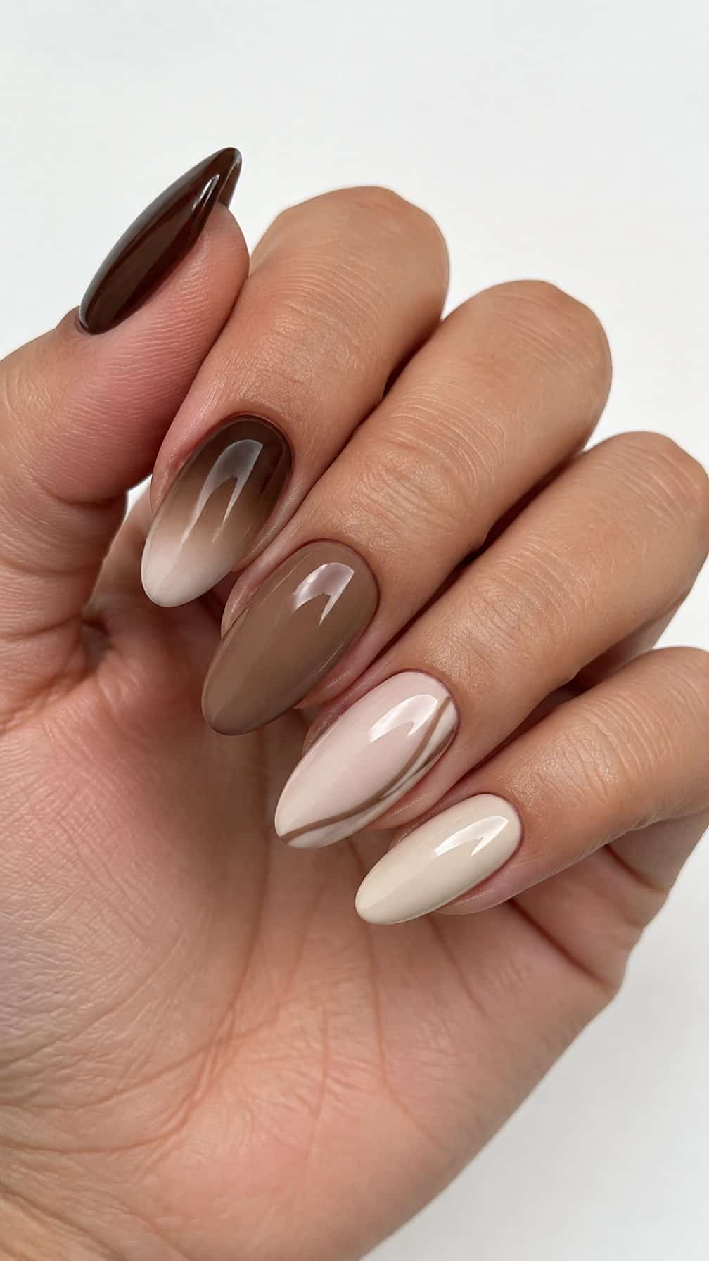 Almond-shaped brown and cream ombre nails