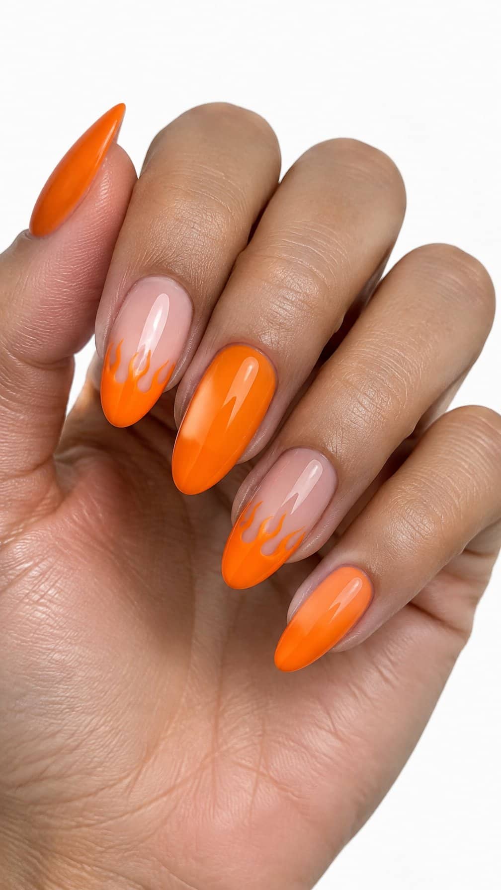 Glossy orange flame French-tip nails