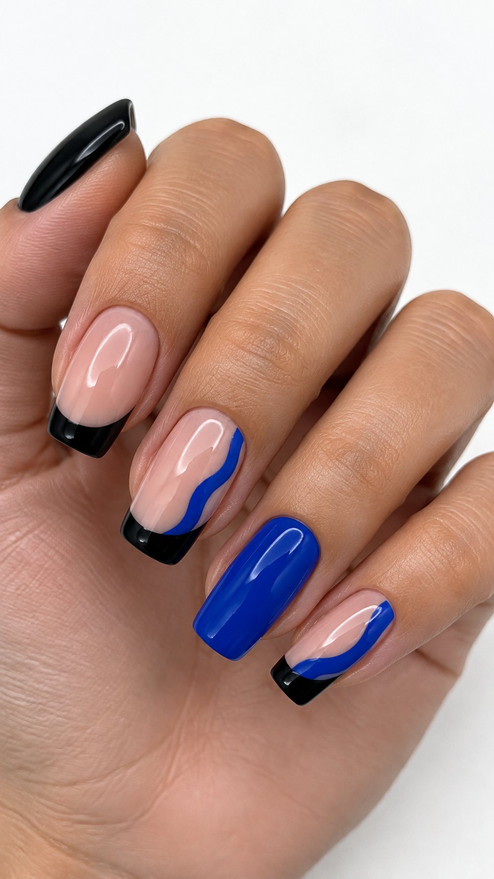 Glossy black and cobalt-blue manicure designs
