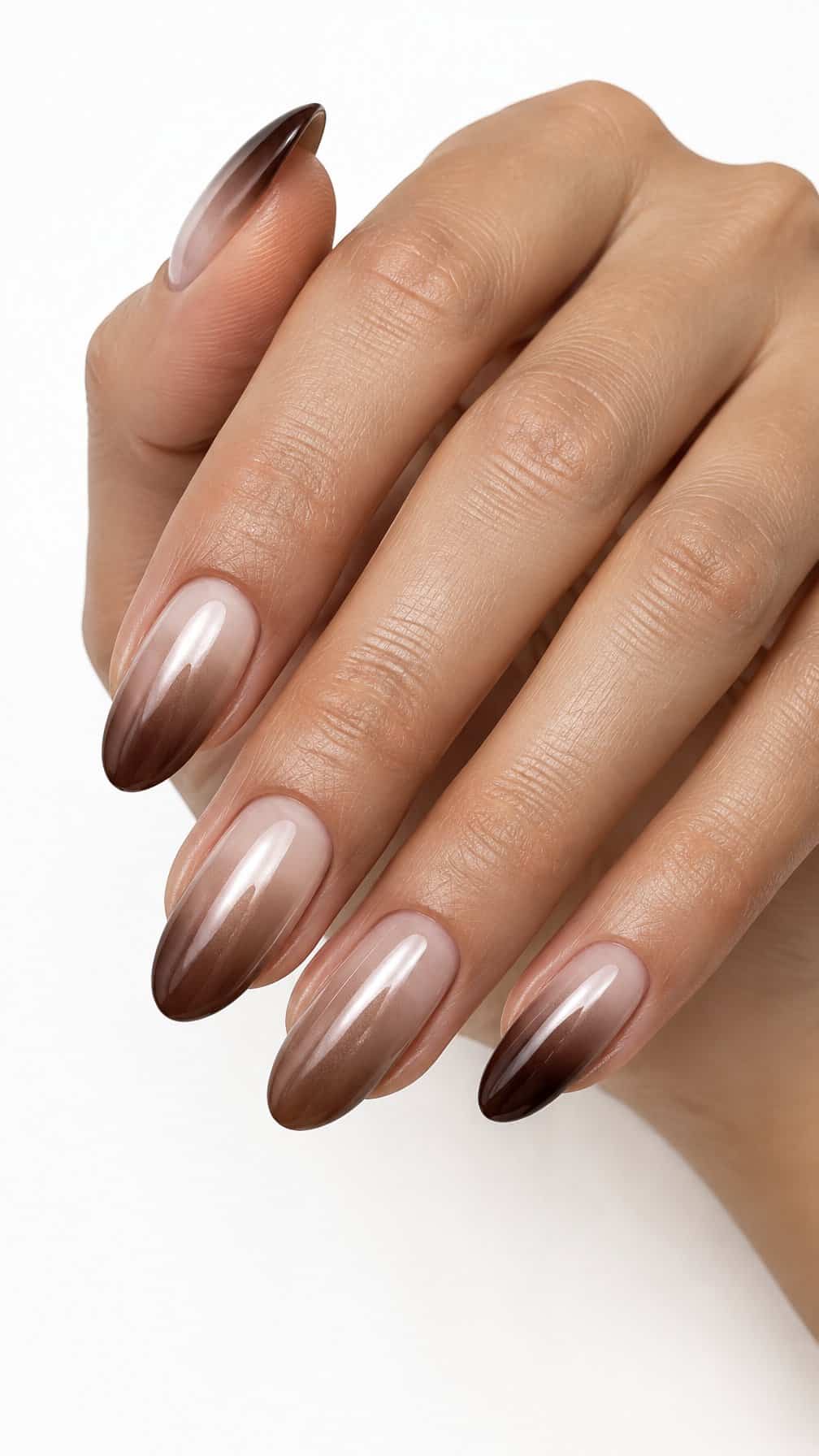 Glossy brown ombre almond-shaped nails