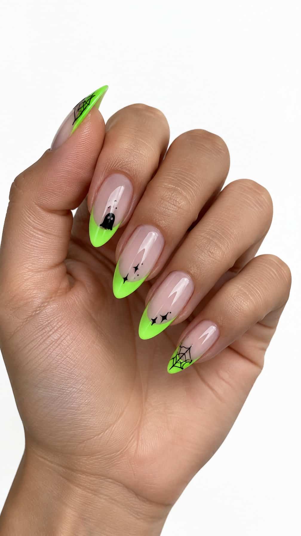 Glossy nude nails and bright neon green French tips