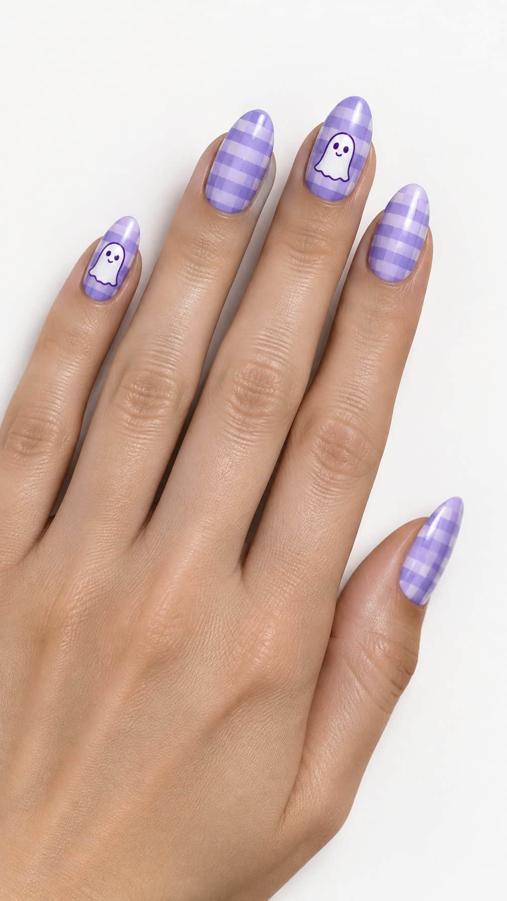 Lavender gingham nails decorated with tiny white ghost designs