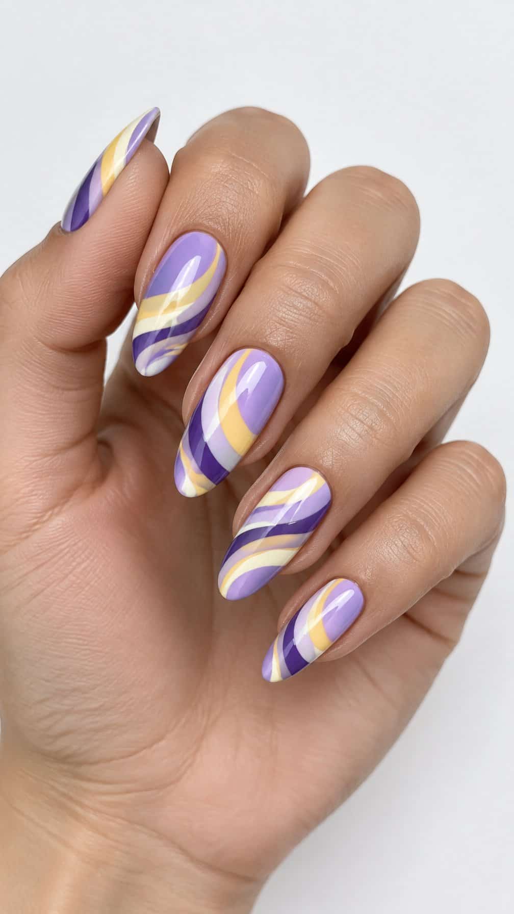 Lavender, white, yellow, and purple swirl nail art