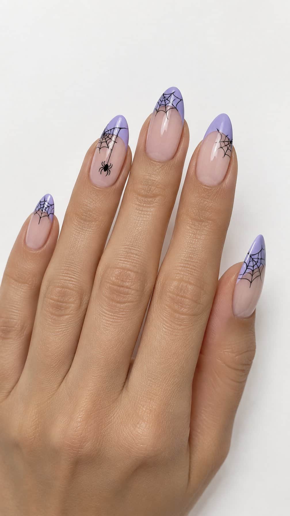 Lilac French-tip nails decorated with delicate black spiderweb designs