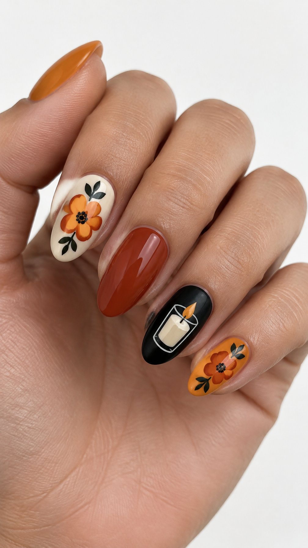 Glossy marigold and candle-themed nail art