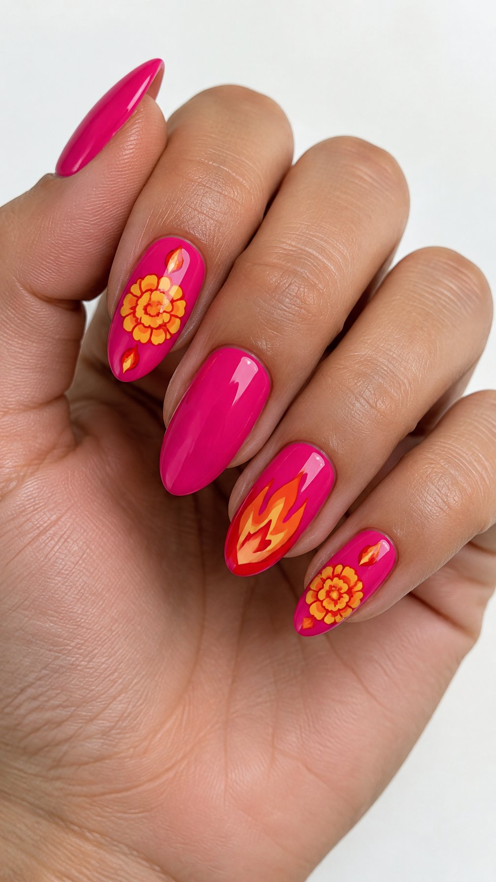 Glossy hot pink nails decorated with orange and yellow flowers and flame designs