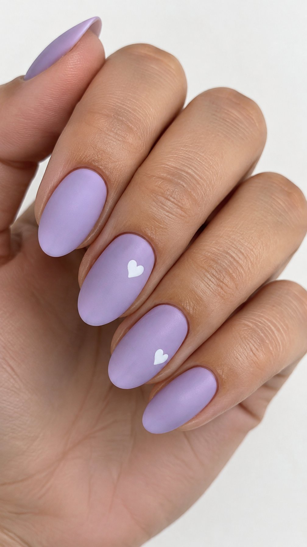 Lavender nails and small white hearts