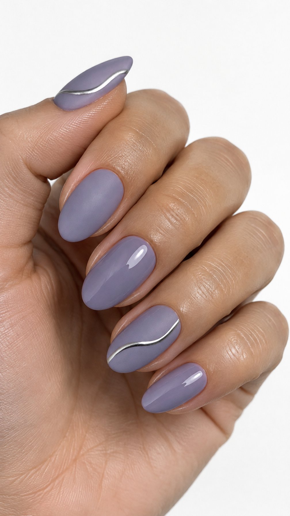 Dusty lavender manicured nails featuring thin silver accent lines