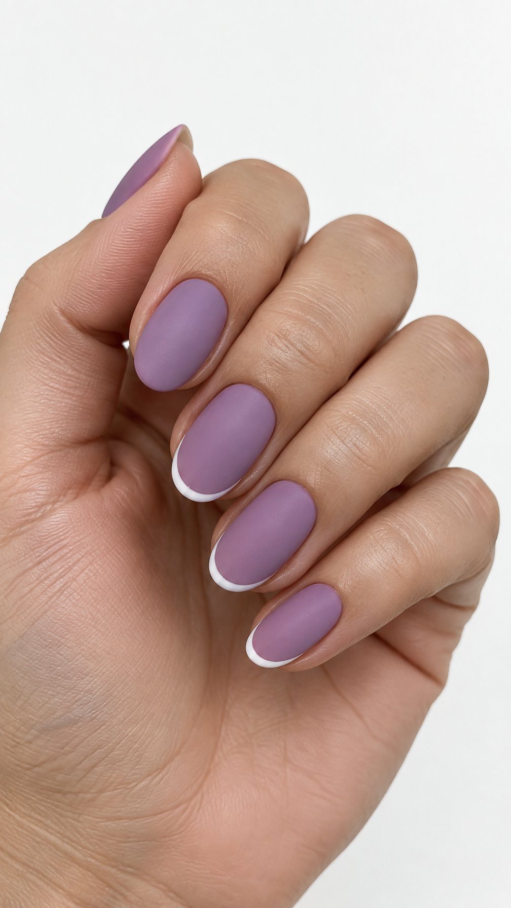 Matte orchid-purple nails and thin white French tips