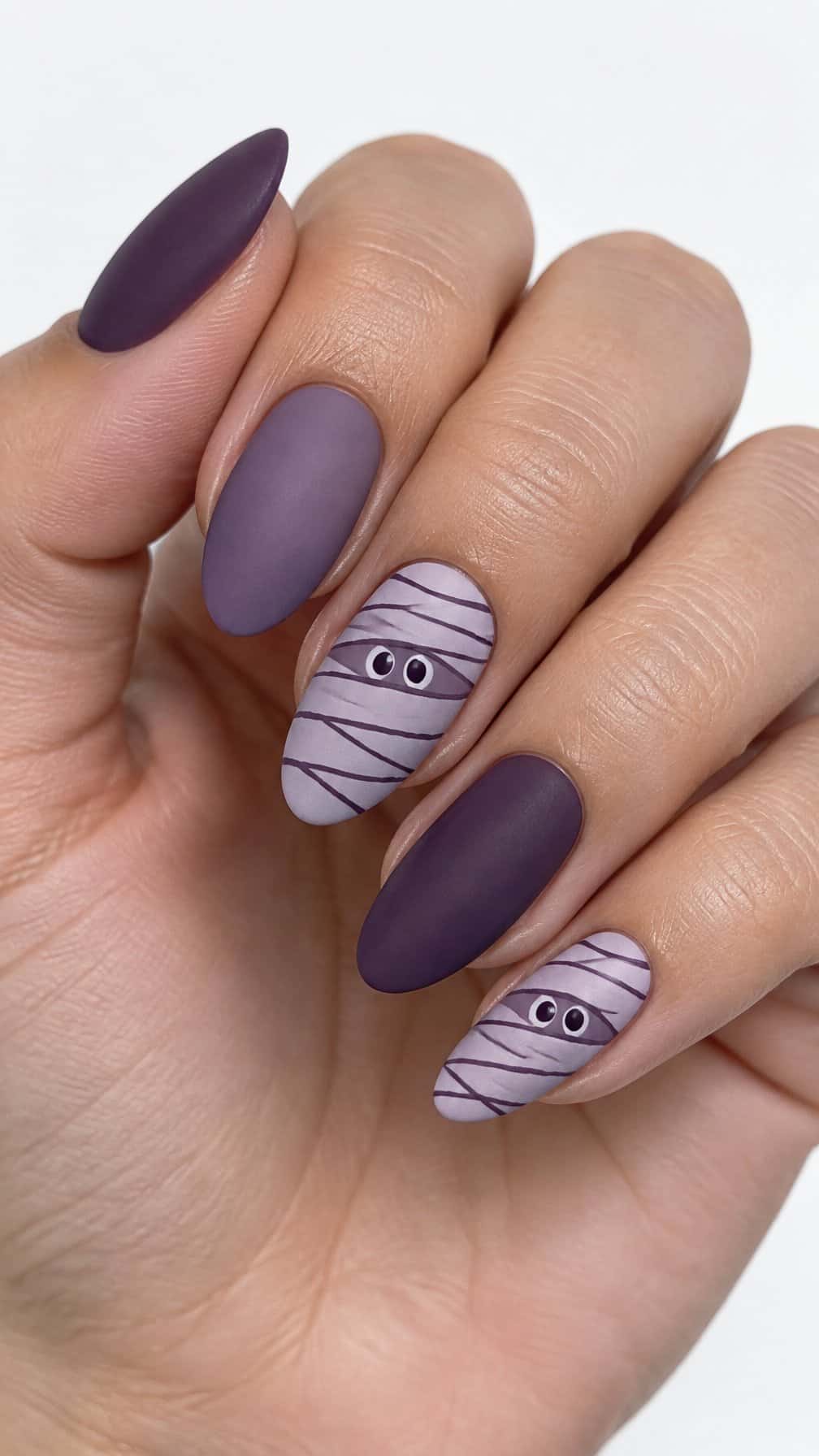 Purple Halloween mummy nail designs