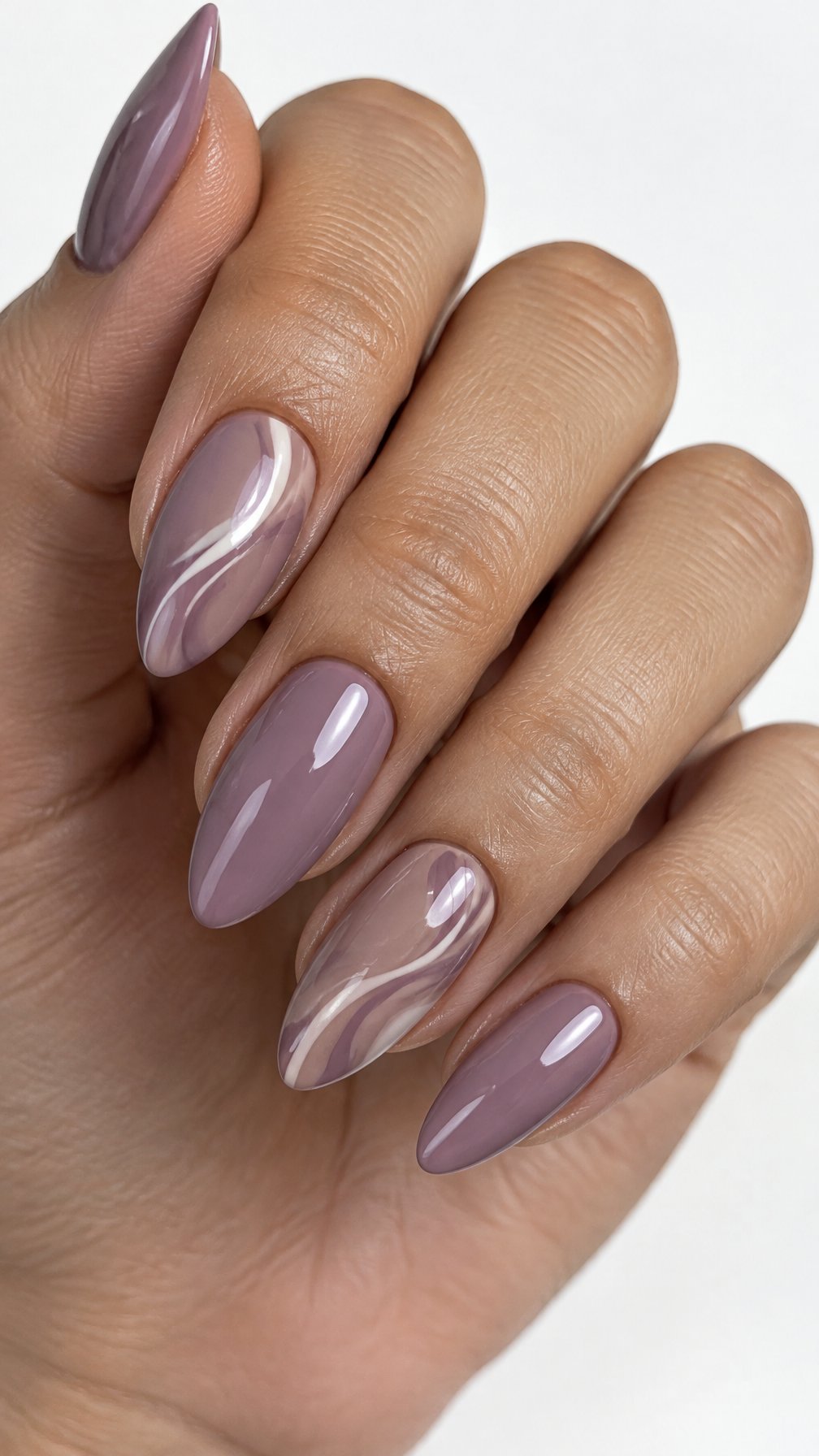 Glossy mauve almond-shaped nails