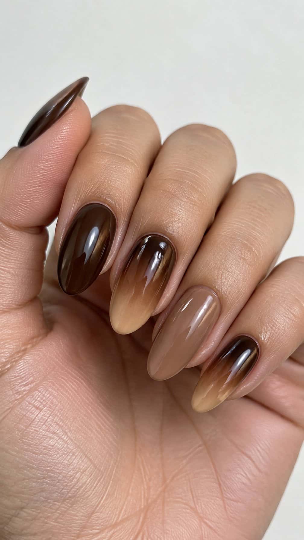 Glossy brown ombre manicure