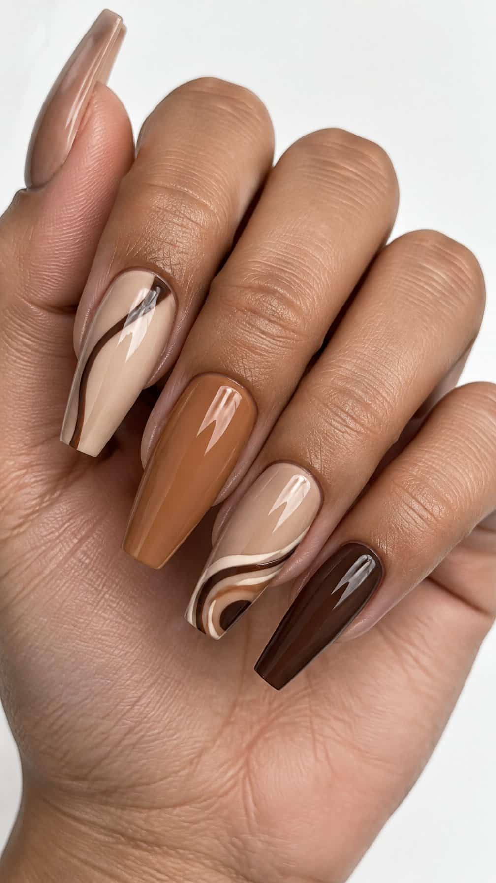 Glossy brown ombre coffin-shaped manicure