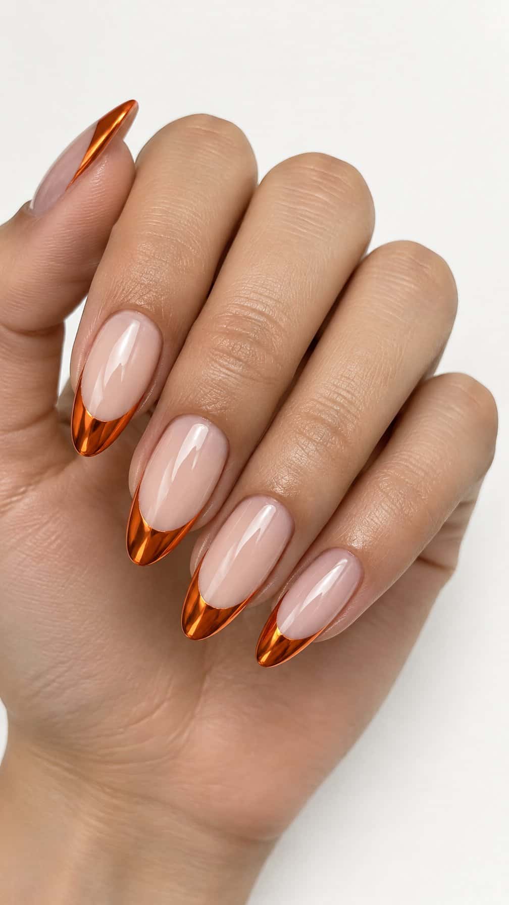 Glossy orange French-tip nails rests