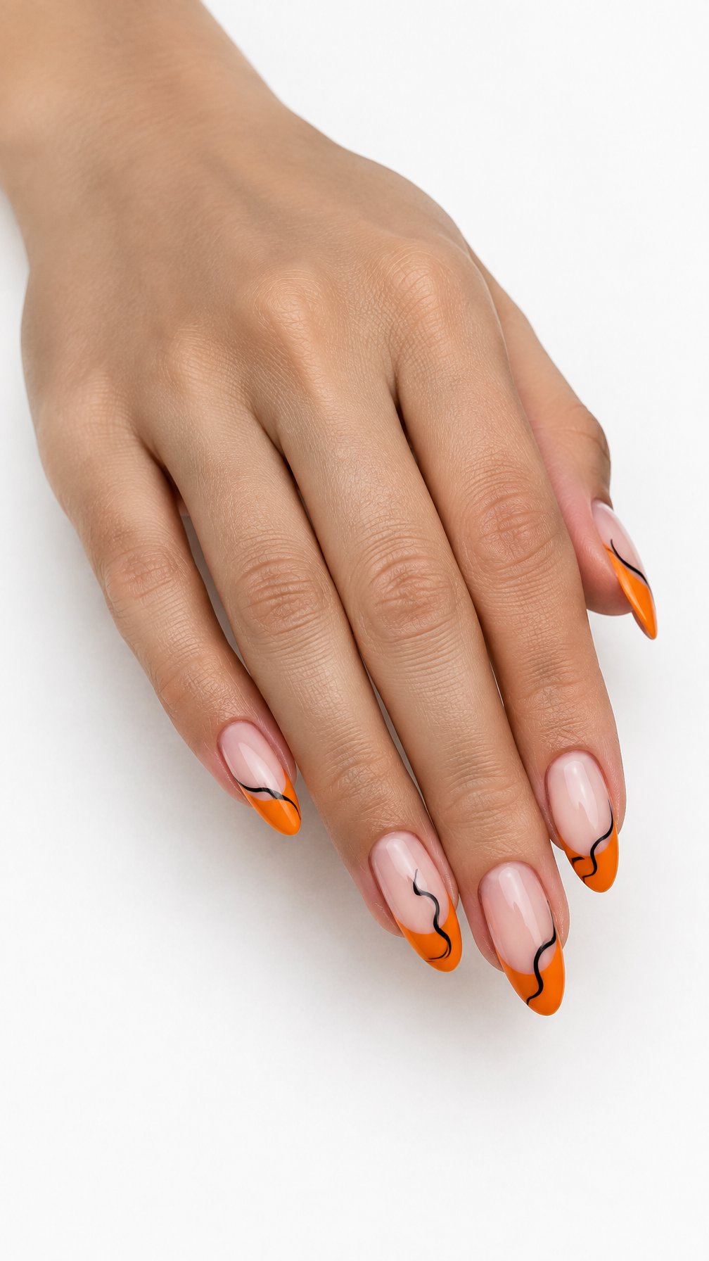 Glossy orange French tip nails decorated with abstract black swirls rests