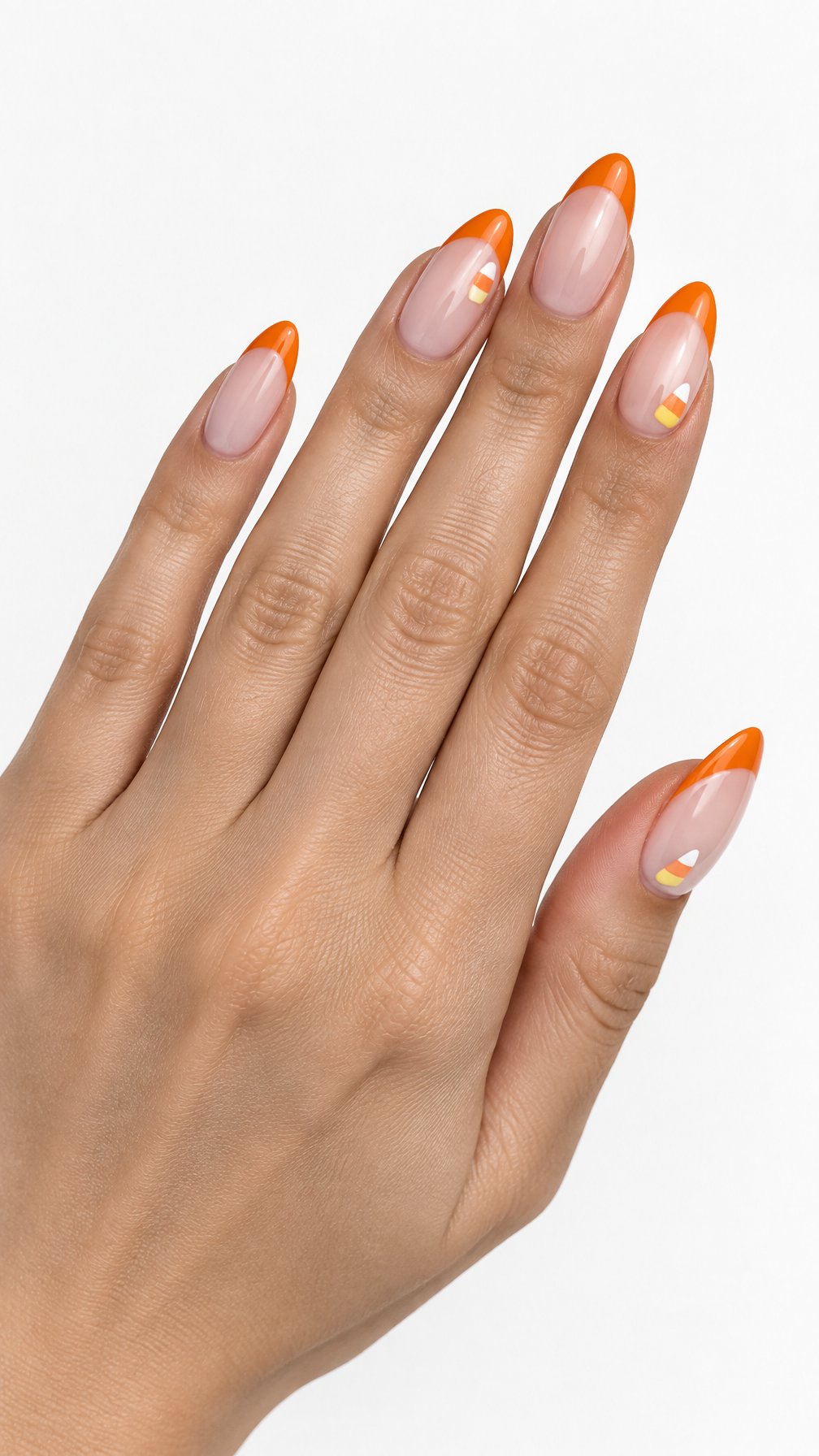 Glossy orange French tip nails and small candy corn designs