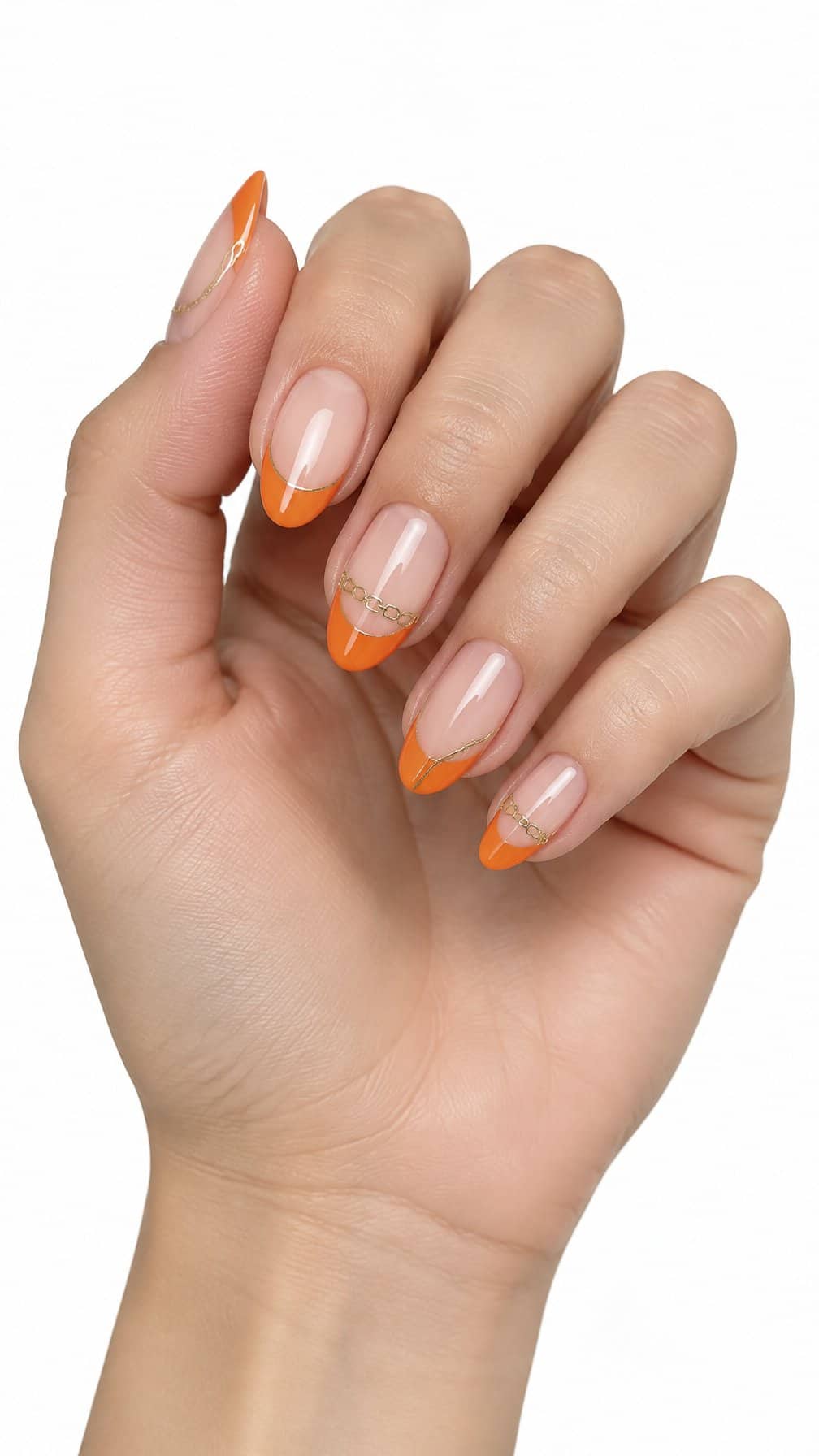 Glossy orange French tip nails and delicate gold chain details