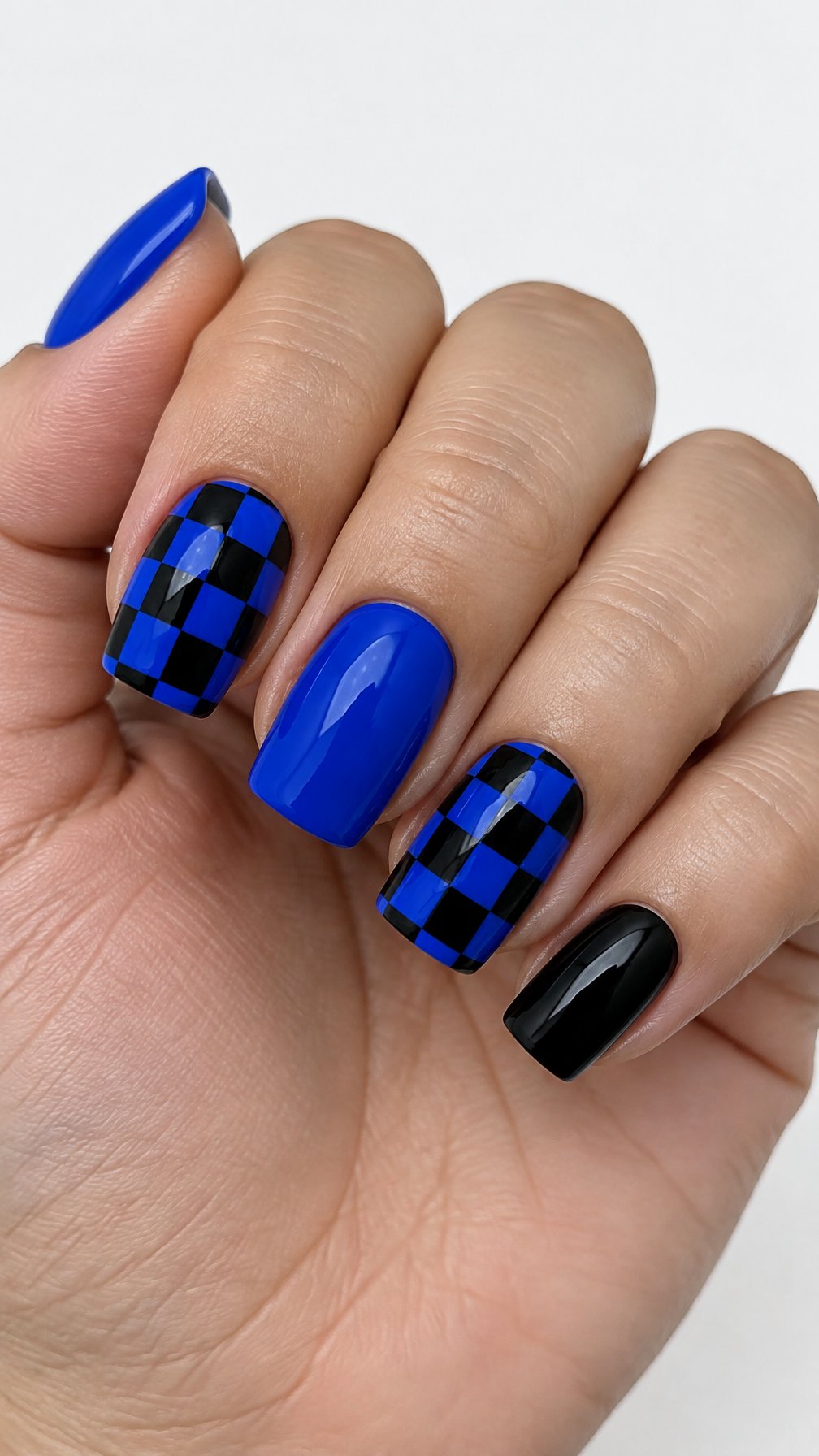 Glossy black and royal blue checkerboard nails