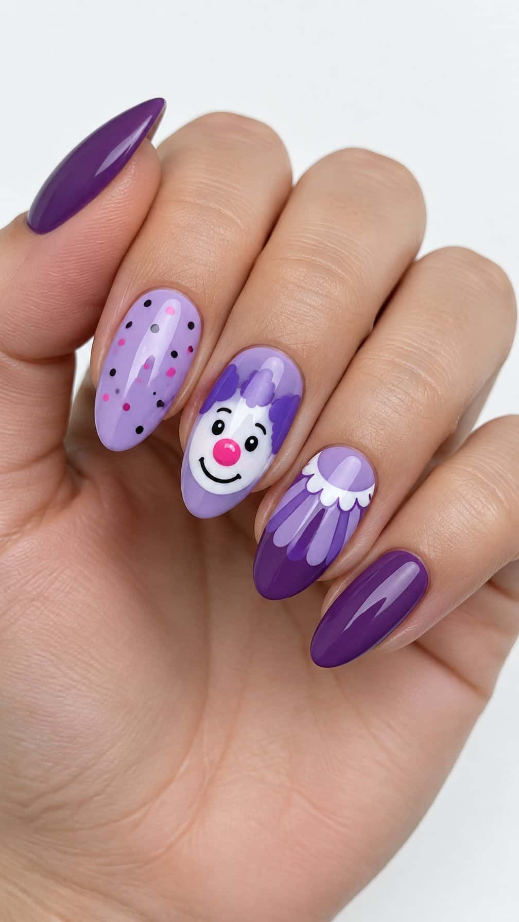 Glossy purple Halloween clown-themed nail art