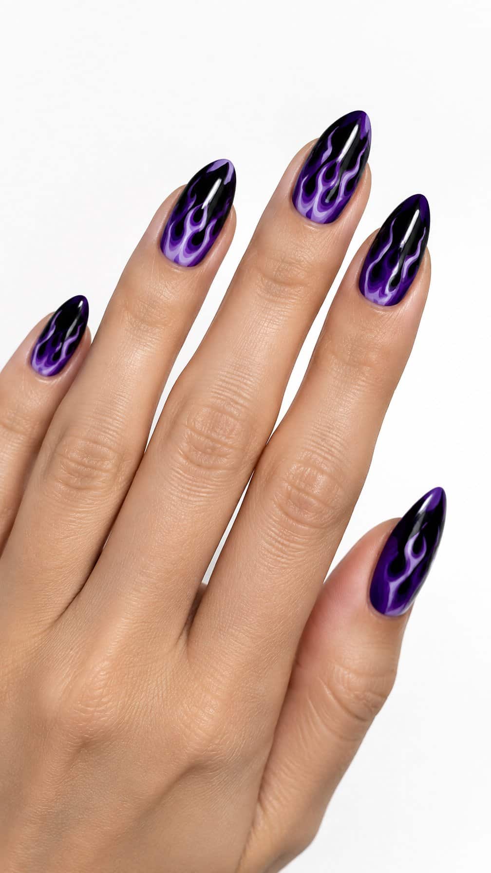 Glossy black nails decorated with purple flame designs