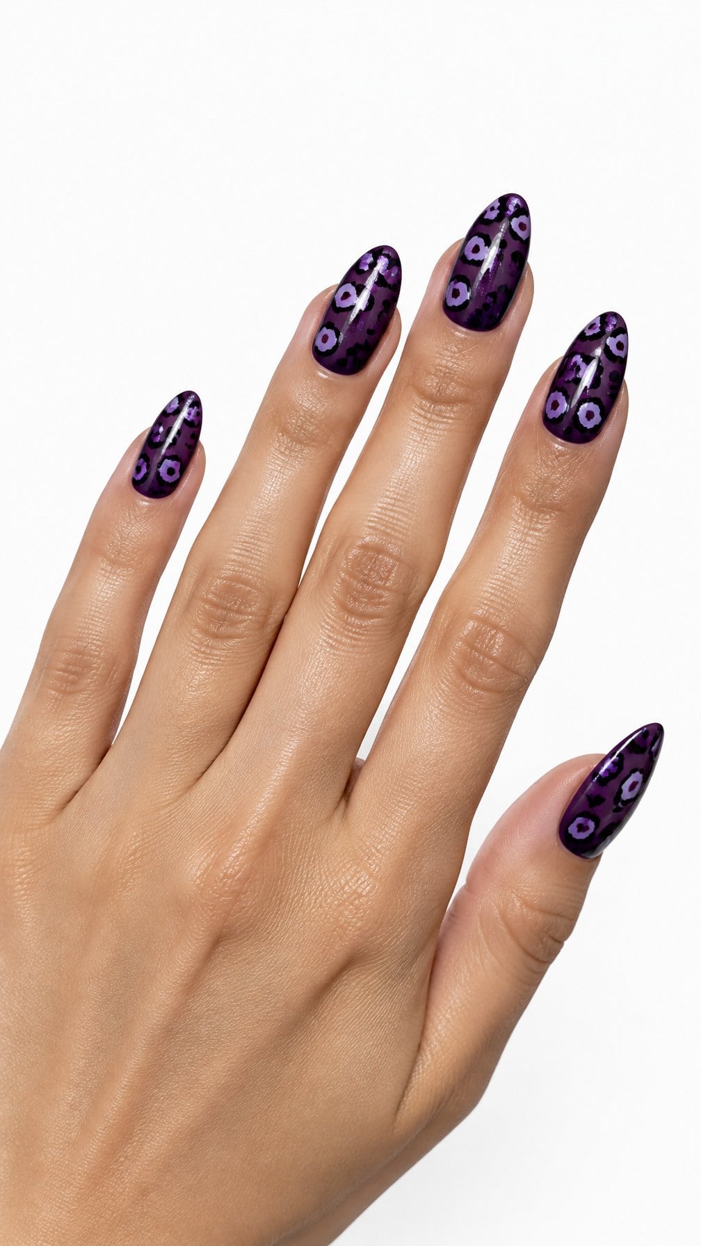 Glossy purple leopard-print nails is shown